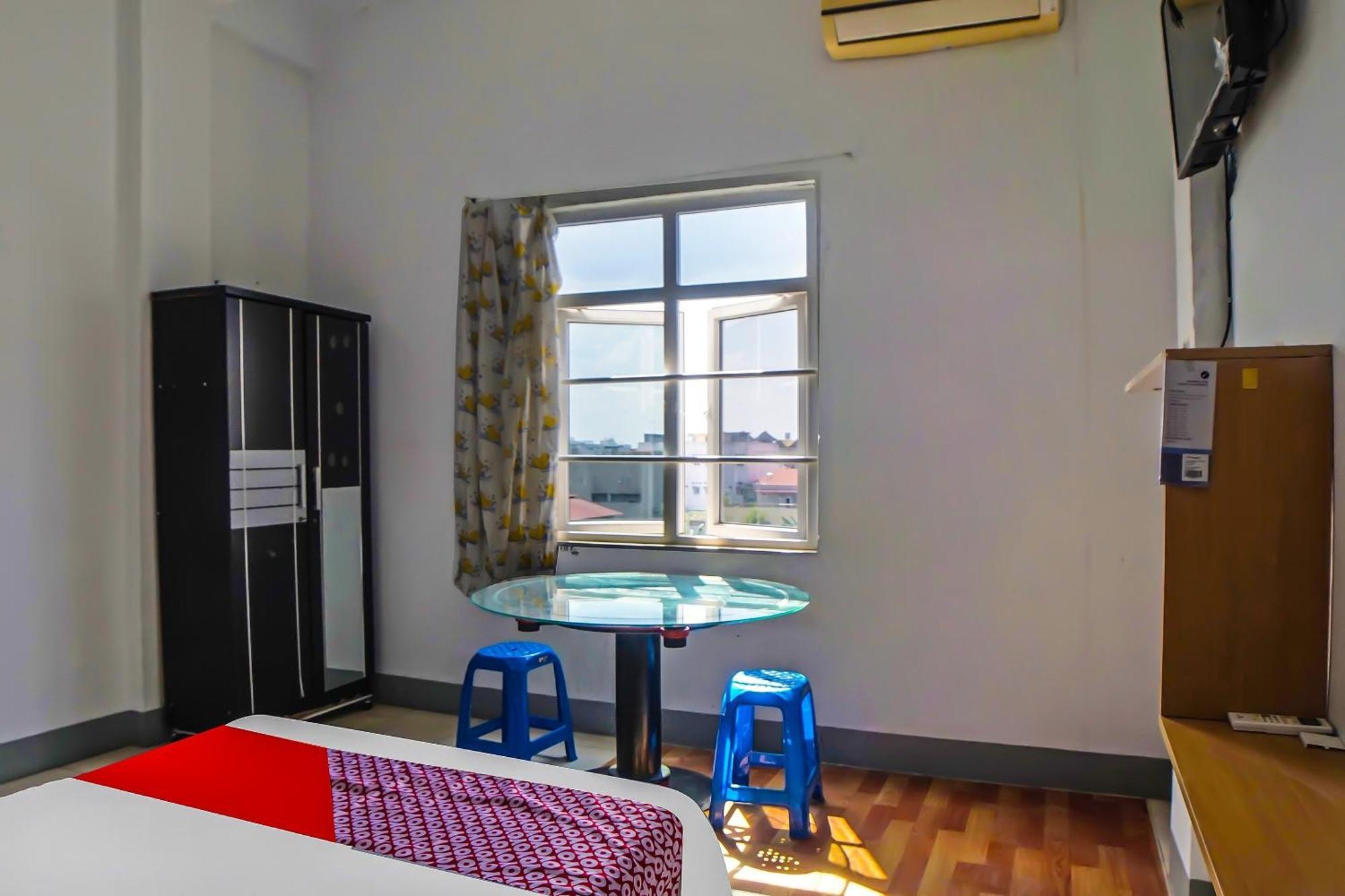 Oyo 92235 Guesthouse Rantang Medan Bagian luar foto