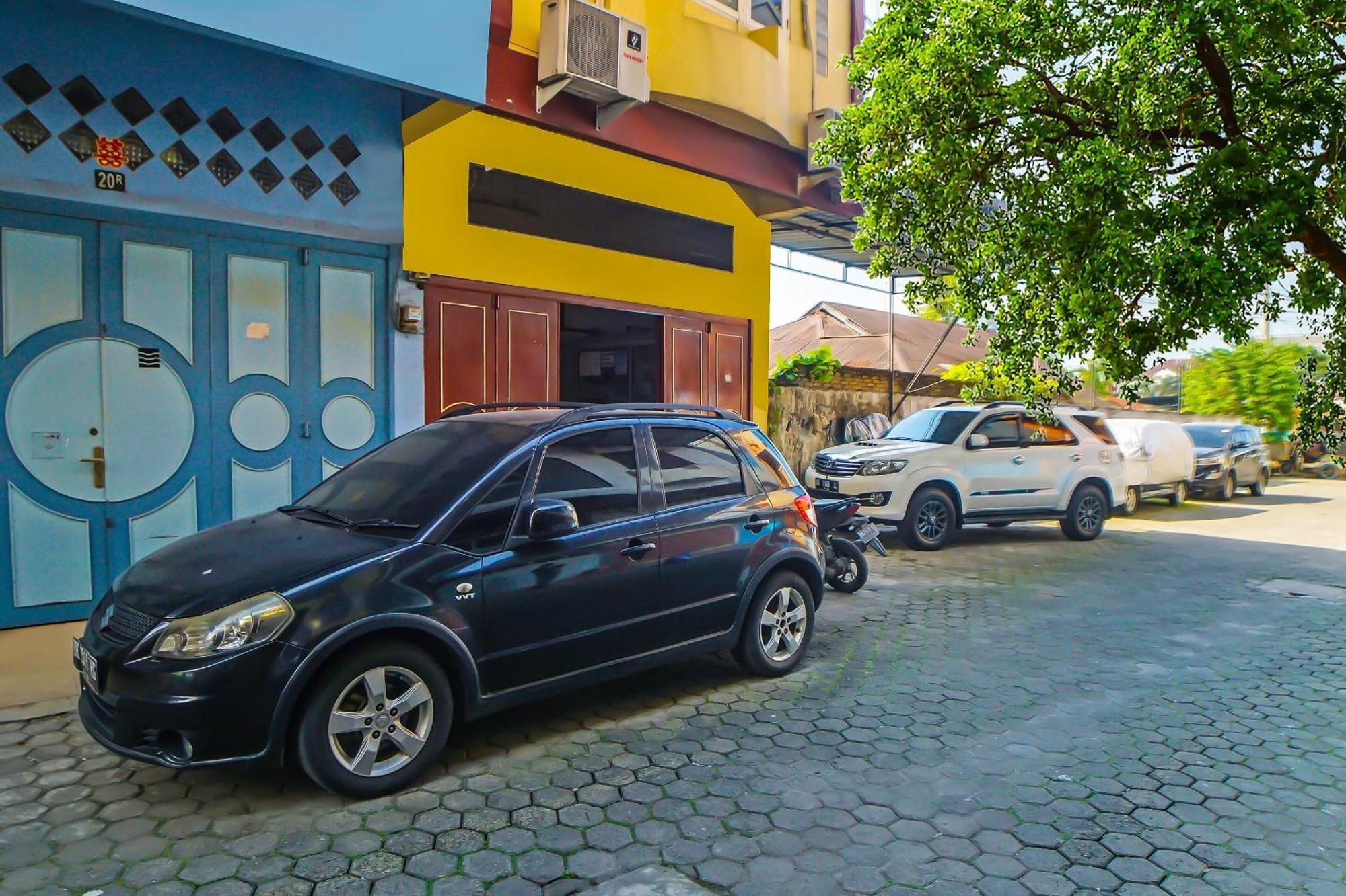 Oyo 92235 Guesthouse Rantang Medan Bagian luar foto