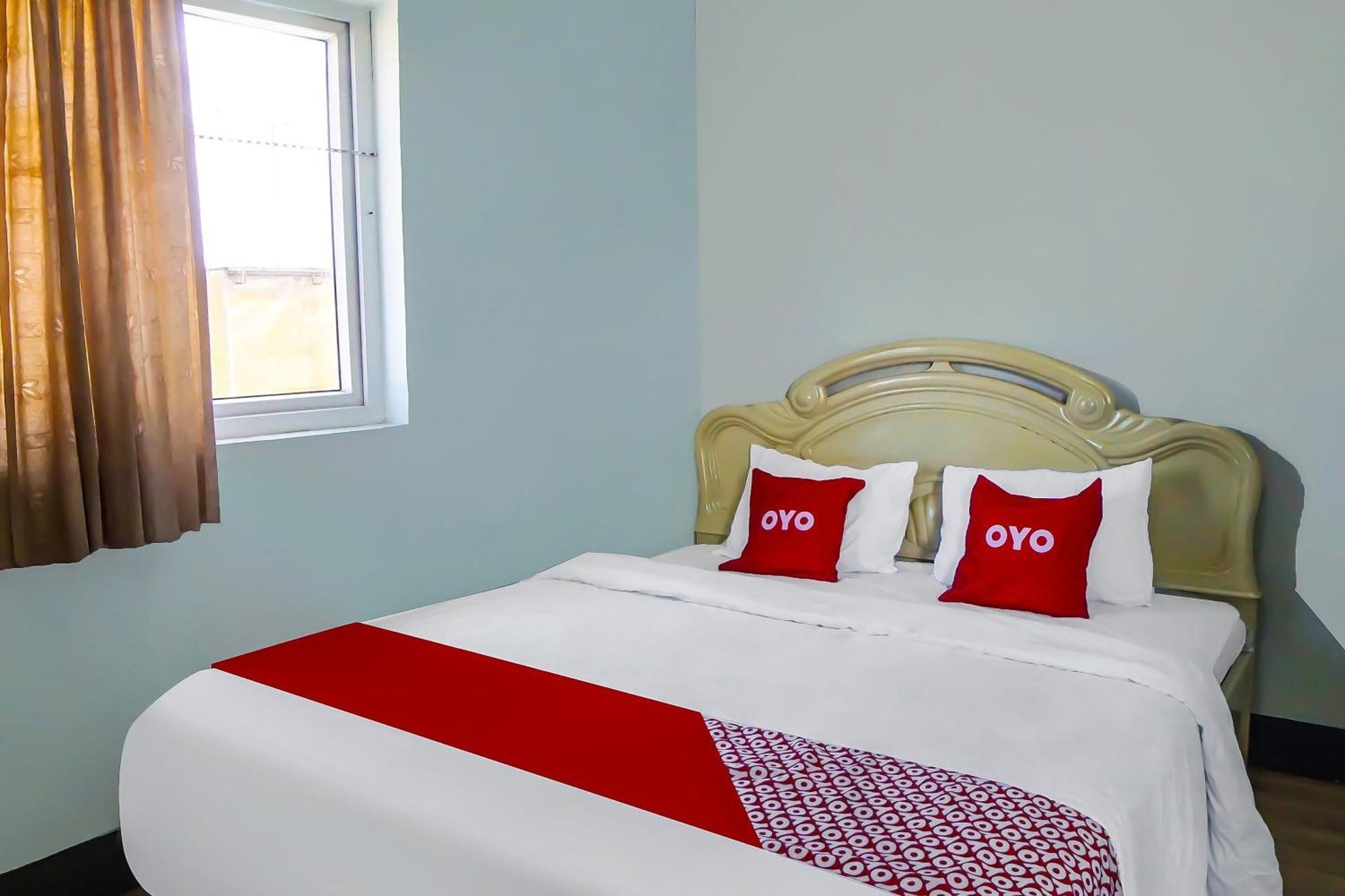 Oyo 92235 Guesthouse Rantang Medan Bagian luar foto